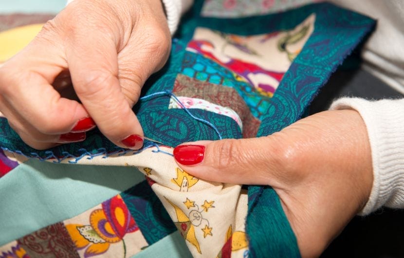 sewing a quilt